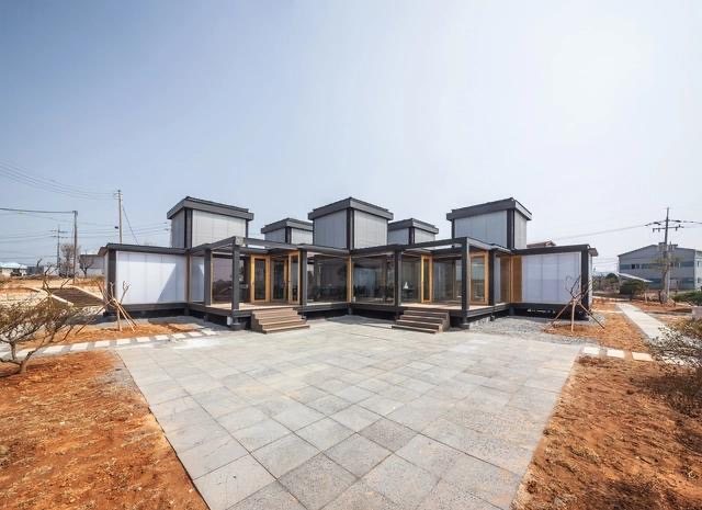 Cottage cluster arranged around a shared courtyard - the building block of a community