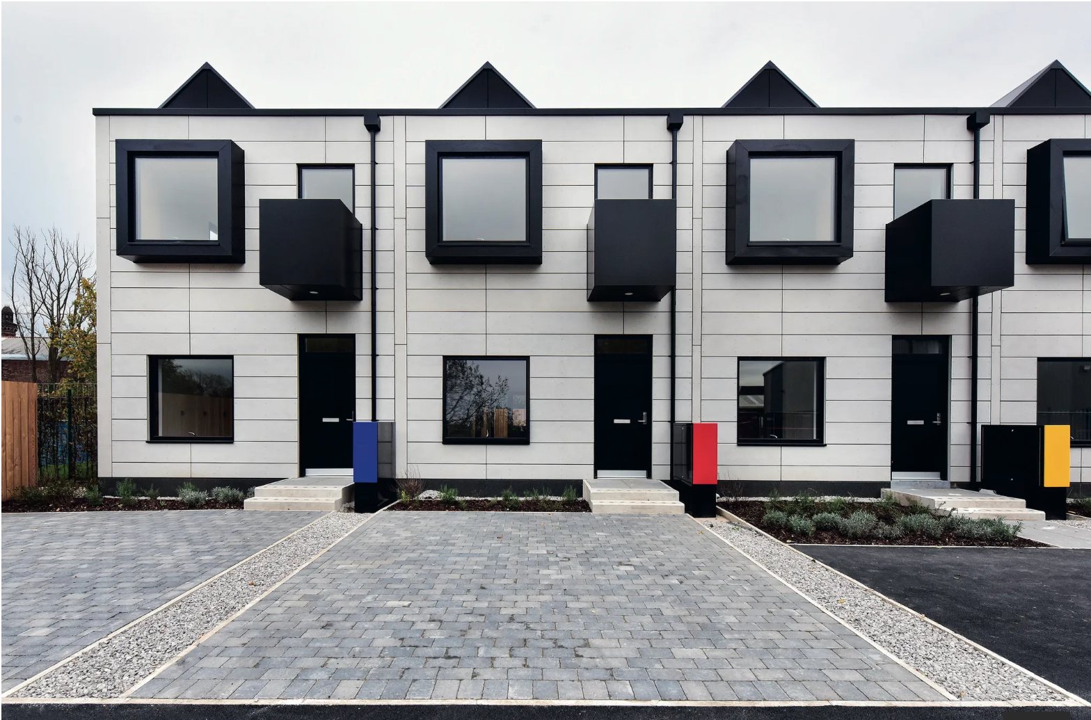 800 sq ft family units - two-story plan with private entries and paved drives